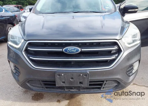 2017 Ford Escape Titanium z USA, uszkodzony, nr VIN 1FMCU0J95HUC34066